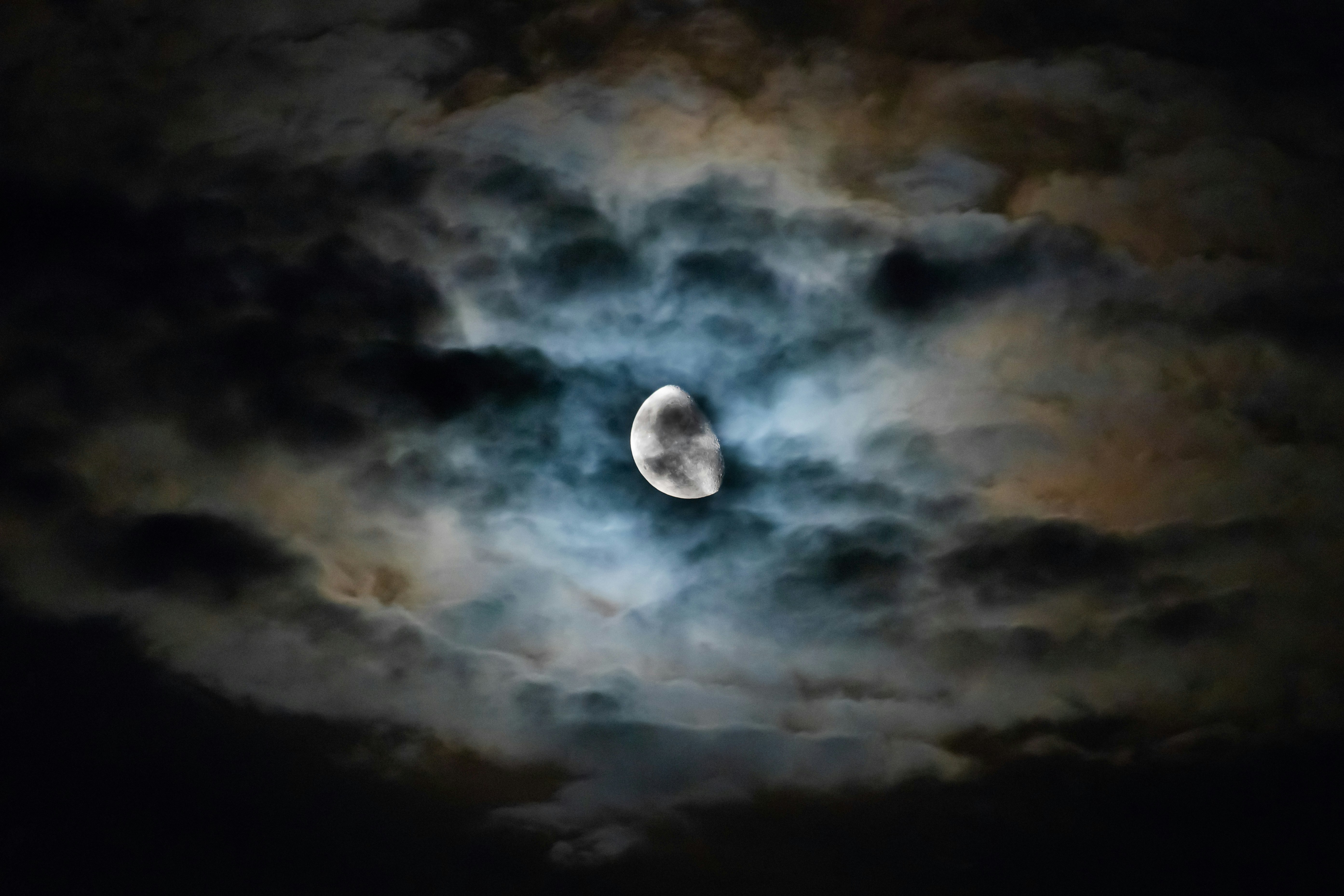 long exposure photography of moon and clouds